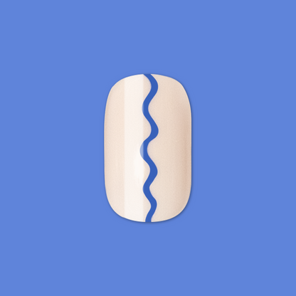 Simple Squiggle | Short | Squoval - Tab Press-On nail with neutral base and blue wavy line design on blue background