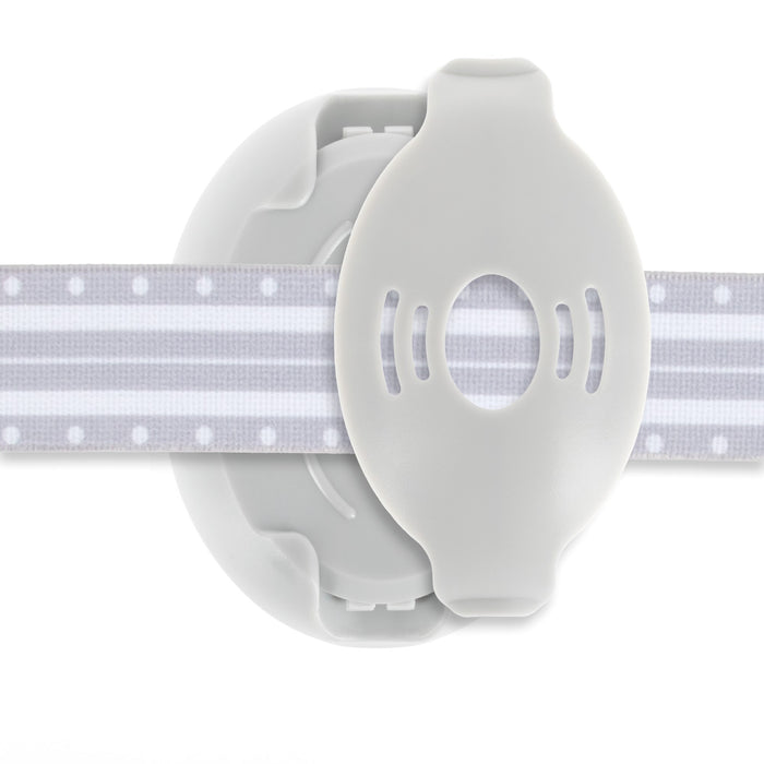 The Soft Sounds Baby Earmuffs | Grey feature a gray and white design with a round plastic clasp and a striped, dotted band like baby earmuff headbands, providing secure, adjustable protection for your child.