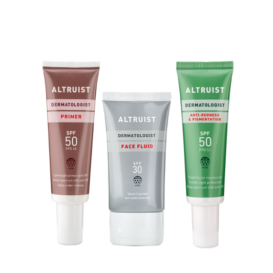 Three Altruiist dermatologist skincare tubes on a white background: a  Primer SPF 50 tube, a  Face Fluid SPF 30 tube, and a green Anti-Redness & Pigmentation SPF 50 tube.