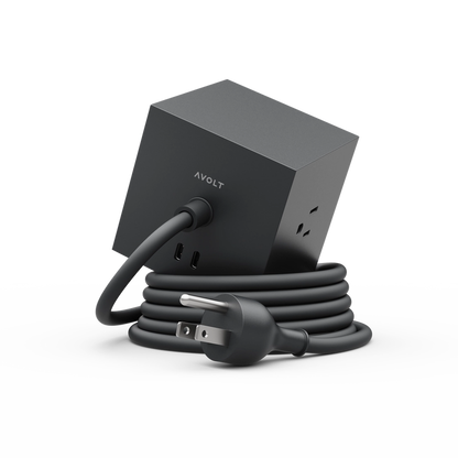 Square 1 extension cord set in black with 3-prong outlets and coiled cable