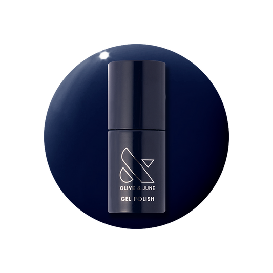 Suited - Gel bottle of deep navy gel polish with glossy finish by Olive and June for long-lasting manicure
