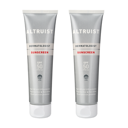 Two tubes of ALTRUIST sunscreen with SPF 50 protection, each labeled clearly with the brand and product information.