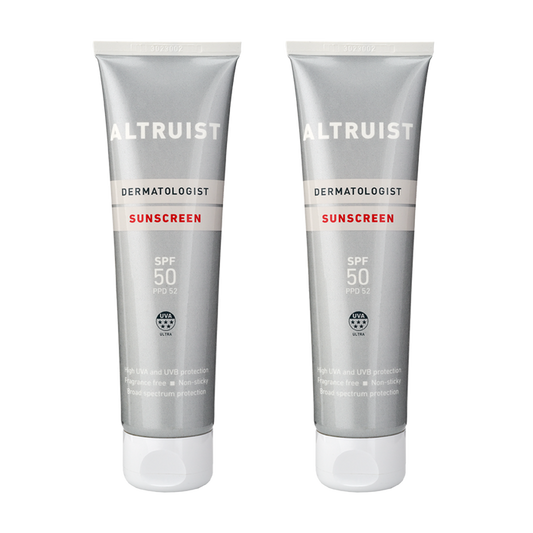 Two tubes of ALTRUIST sunscreen with SPF 50 protection, each labeled clearly with the brand and product information.