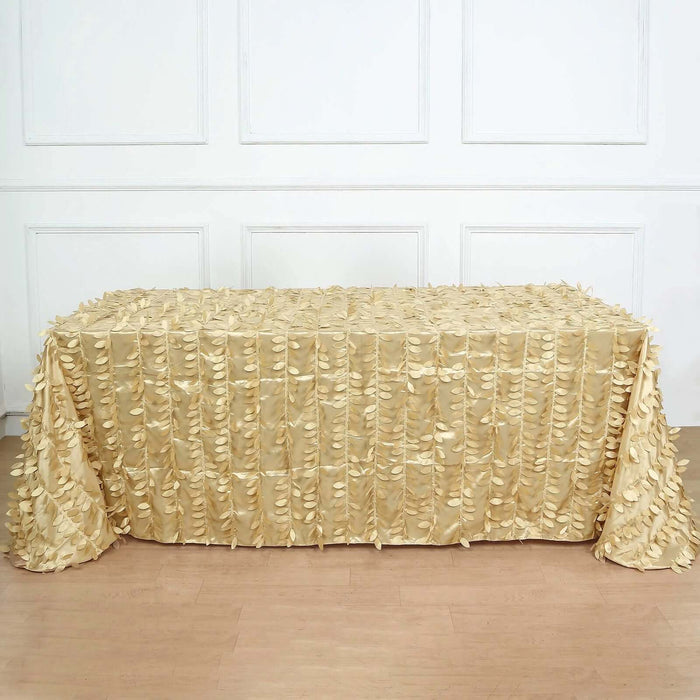 Gold textured tablecloth draped on a table in a bright room.