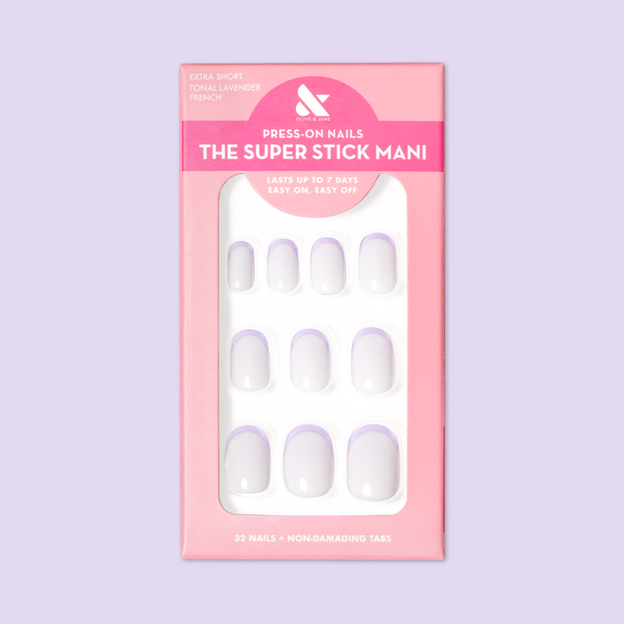 Tonal Lavender French | Extra Short | Round - Tab Press-On nails with lavender French tip design in pink package on lavender background