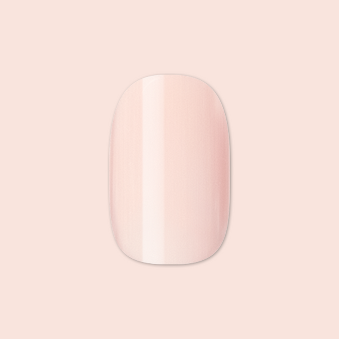 Tutu | Short | Squoval - Tab Press-On showing a single pastel pink false nail for easy at-home mani application