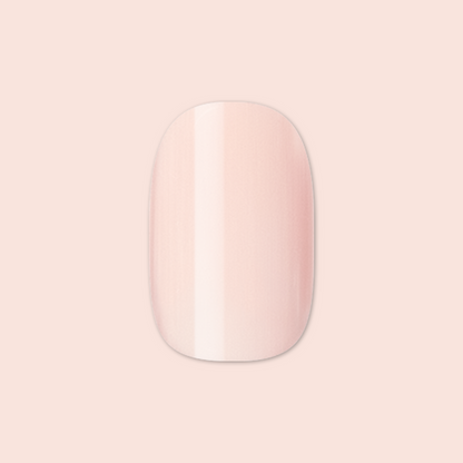 Tutu | Short | Squoval - Tab Press-On showing a single pastel pink false nail for easy at-home mani application