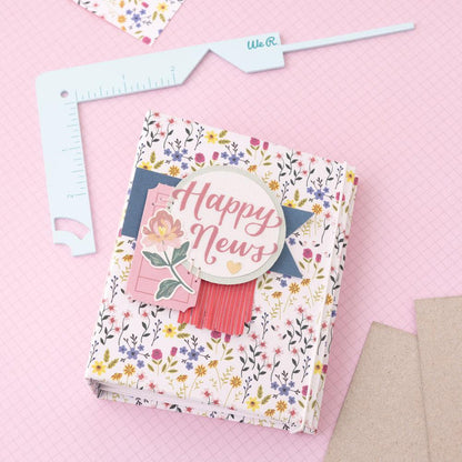 We R Memory - Book Cover Guide - Mint. Perfect book board placement, consistent gaps, trim corners at the proper angle, easily round corners and mark spot for elastic closure. It also includes a scan code for detailed instructions. Available at Embellish Away located in Bowmanville Ontario Canada.