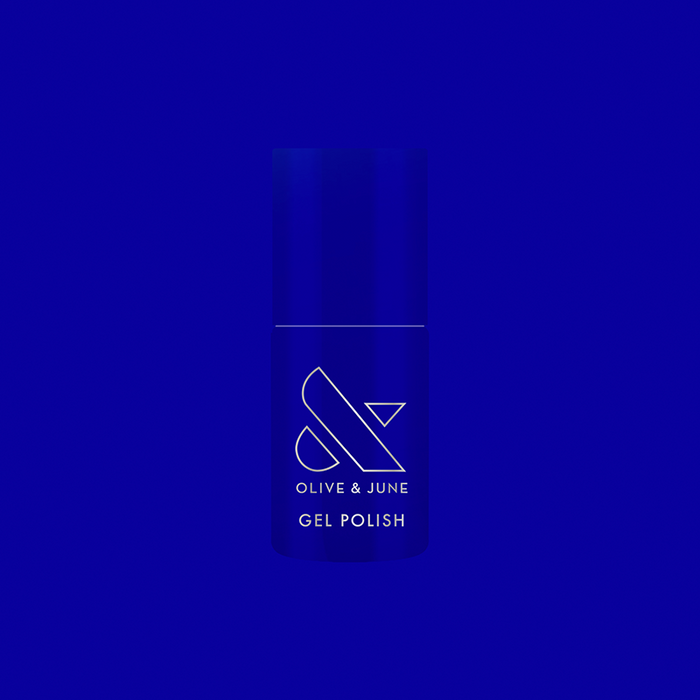 Bottle of Your Mani Looks So Good in Those Jeans - Gel nail polish in bright denim blue with Olive and June branding