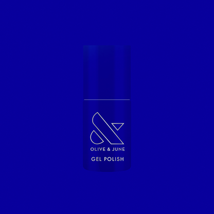Bottle of Your Mani Looks So Good in Those Jeans - Gel nail polish in bright denim blue with Olive and June branding
