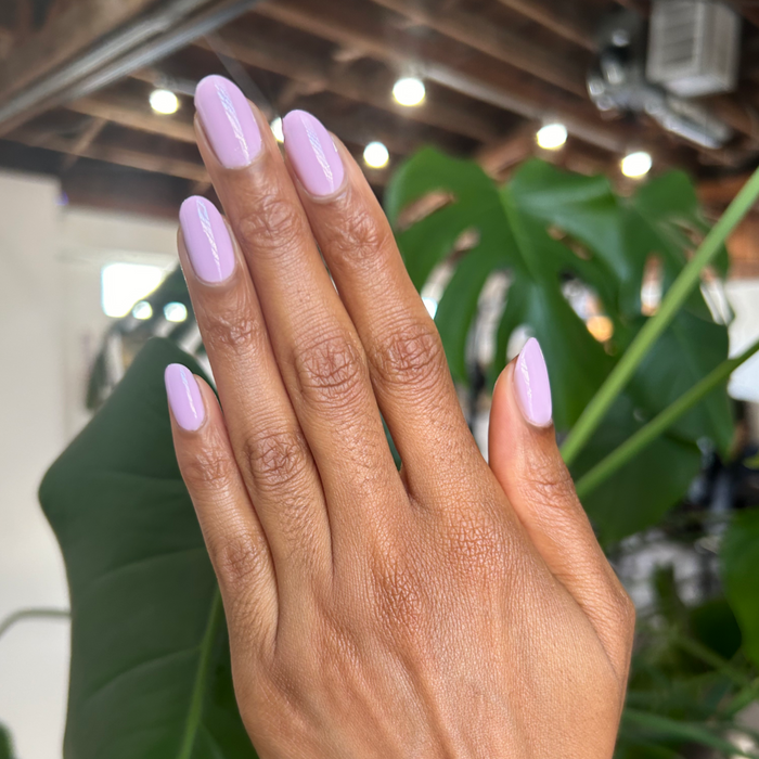 You're Invited - Gel shown on natural nails in a soft lilac shade for a smooth, long-lasting manicure by Olive and June