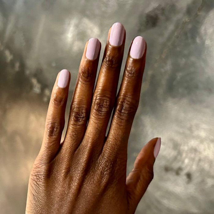 You're Invited - Gel shown on smooth natural nails in a playful lilac for a long-lasting manicure by Olive and June